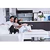 happy young couple relax at modern home living room indoor
