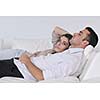 happy young couple relax at modern home living room indoor