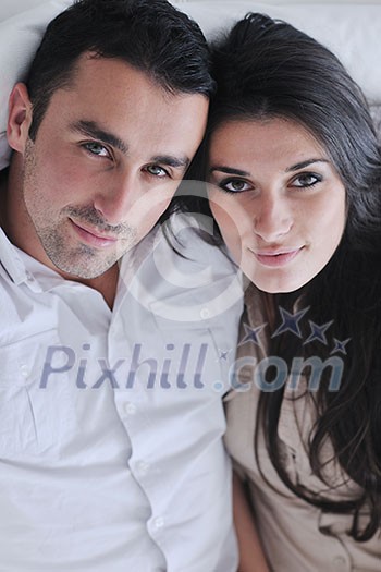 happy young couple relax at modern home living room indoor happy young couple relax at modern home living room indoor