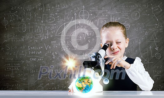 Cute girl with microscope against blackboard. Elements of this image are furnished by NASA Cute girl with microscope against blackboard. Elements of this image are furnished by NASA