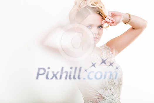 Gorgeous bride on her wedding day (color toned image; shallow DOF) Gorgeous bride on her wedding day (color toned image; shallow DOF)