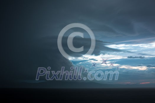 Gathering storm clouds in a vast landscape Gathering storm clouds in a vast landscape