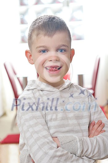 Happy young boy portrait at home. Smile without teeth. Happy young boy portrait at home. Smile without teeth.