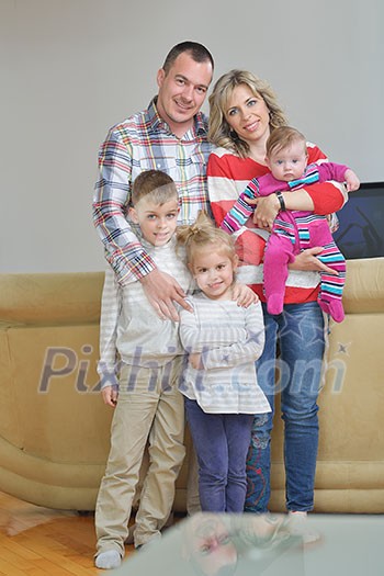 hapy young family have fun with their children at modern living room home indoors hapy young family have fun with their children at modern living room home indoors
