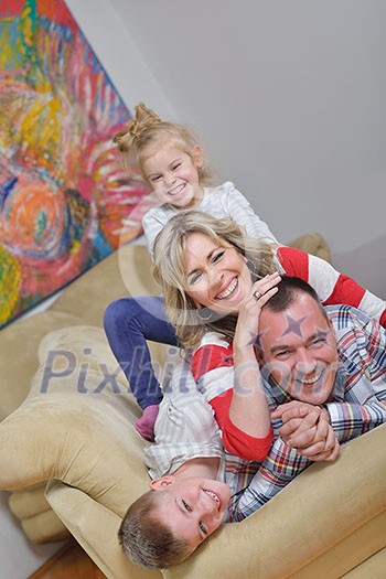 hapy young family have fun with their children at modern living room home indoors hapy young family have fun with their children at modern living room home indoors