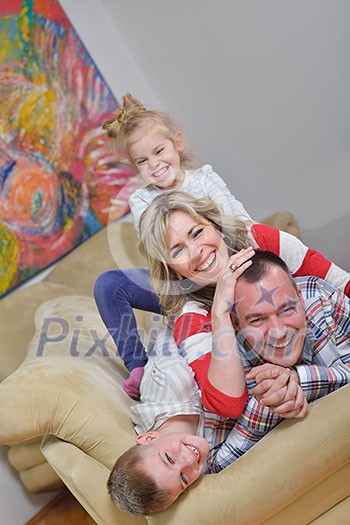 hapy young family have fun  with their children at modern living room home indoors