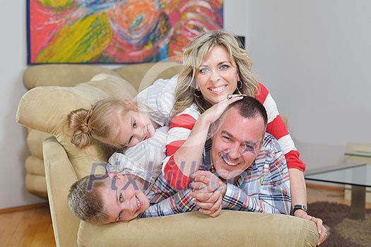 hapy young family have fun with their children at modern living room home indoors hapy young family have fun with their children at modern living room home indoors