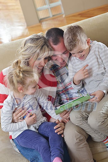 hapy young family have fun with their children at modern living room home indoors hapy young family have fun with their children at modern living room home indoors