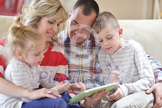 hapy young family have fun with their children at modern living room home indoors hapy young family have fun with their children at modern living room home indoors