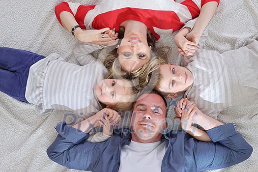 hapy young family have fun with their children at modern living room home indoors hapy young family have fun with their children at modern living room home indoors
