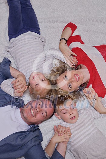 hapy young family have fun with their children at modern living room home indoors hapy young family have fun with their children at modern living room home indoors