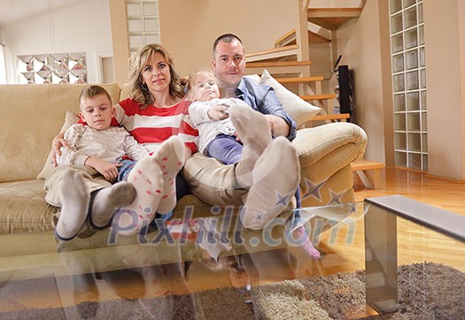 hapy young family have fun with their children at modern living room home indoors hapy young family have fun with their children at modern living room home indoors