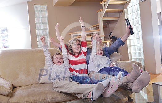 hapy young family have fun with their children at modern living room home indoors hapy young family have fun with their children at modern living room home indoors