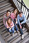 happy young teens group in school have fun an learning lessons