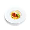 Italian spaghetti topped with bolognaise, or bolognese, sauce with tomatoes, meat and cheese on a plain white plate