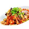 Pasta food with shrimps, herbs and mashrooms isolated on white background in studio