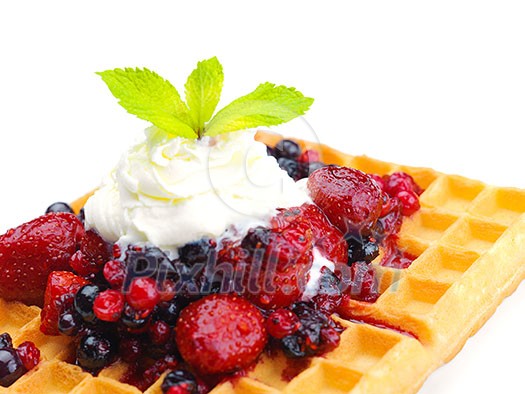 a selection of three italian gelato ice-cream scoops topped with nuts, chocolate, fruit served on crispy waffels a selection of three italian gelato ice-cream scoops topped with nuts, chocolate, fruit served on crispy waffels
