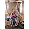 hapy young family have fun  with their children at modern living room home indoors