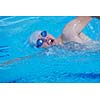 group of happy kids children   at swimming pool class  learning to swim