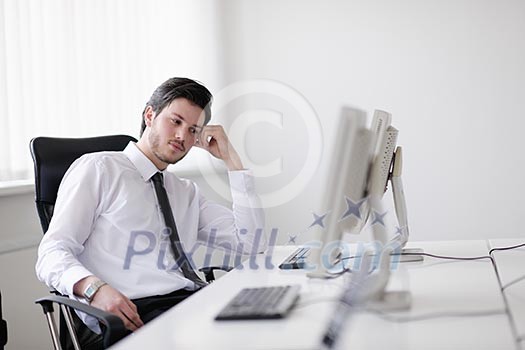 Portrait of a young business man looking depressed and worried from work at meeting office indors Portrait of a young business man looking depressed and worried from work at meeting office indors