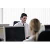 business people group with  headphones giving support in  help desk office to customers, manager giving training and education instructions