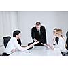 Group of happy young  business people in a meeting at office