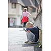 sad and unhappy alone child cry and have emotion problem on street