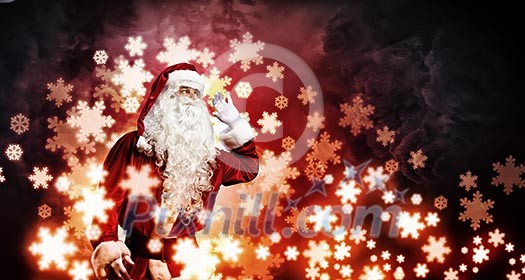 Image of Santa Claus in red costume against dark background Image of Santa Claus in red costume against dark background