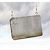 Image of cement blank banner hanging on ropes