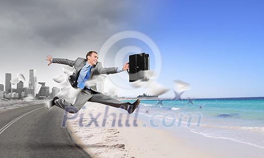 Image of businessman running away from office work Image of businessman running away from office work