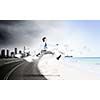 Image of businessman running away from office work