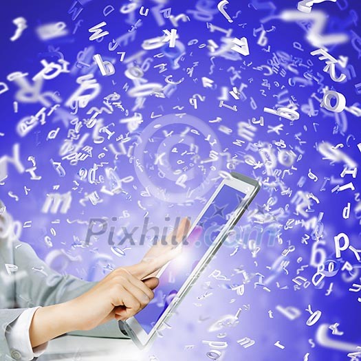 Close up image of human hand touching screen of tablet pc Close up image of human hand touching screen of tablet pc