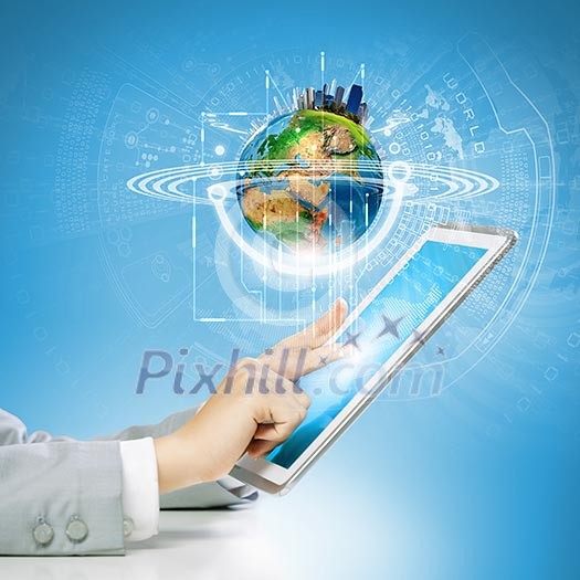 Close up image of human hand touching screen of tablet pc. Elements of this image are furnished by NASA Close up image of human hand touching screen of tablet pc. Elements of this image are furnished by NASA