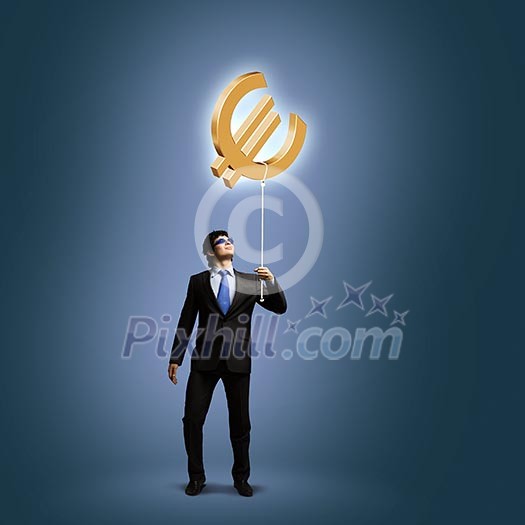 Image of businessman catching euro symbol. Currency concept Image of businessman catching euro symbol. Currency concept