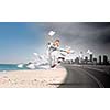 Image of businesswoman jumping joyfully. Summer vacation