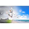 Image of businesswoman jumping joyfully. Summer vacation