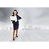 Top view of smiling businesswoman holding white blank banner. Place for text