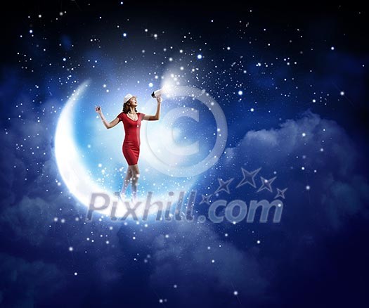 Young woman in red dress speaking in megaphone Young woman in red dress speaking in megaphone