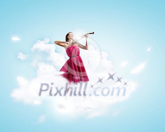 Young attractive woman in red dress playing violin Young attractive woman in red dress playing violin