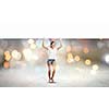 Young woman in casual holding white blank banner. Place for text