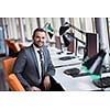 happy young business man portrait in bright modern office indoor
