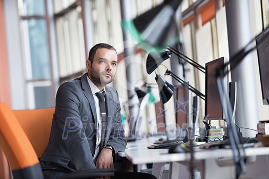 happy young business man portrait in bright modern office indoor happy young business man portrait in bright modern office indoor