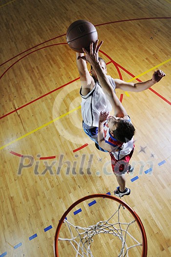 competition cencept with people who playing and exercise basketball sport in school gym competition cencept with people who playing and exercise basketball sport in school gym