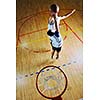 competition cencept with people who playing and exercise  basketball sport  in school gym