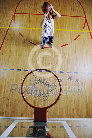 basketball game playeer shooting on basket indoor in gym basketball game playeer shooting on basket indoor in gym