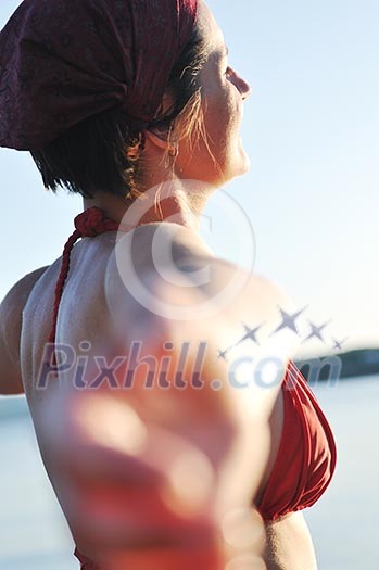 happy girl spreading hands and enjoy in sunlight at summer vacation happy girl spreading hands and enjoy in sunlight at summer vacation
