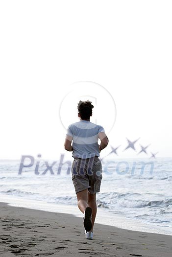 man running on beach man running on beach