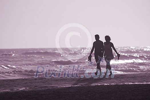 romantic couple walking on beach romantic couple walking on beach