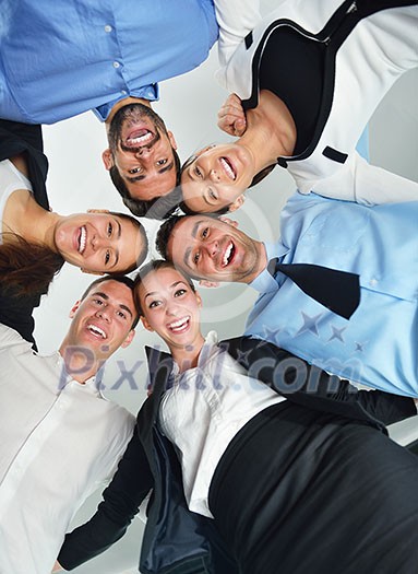 Closeup of happy business people with their heads together representing concept of ftiendship and teamwork isolated on white background Closeup of happy business people with their heads together representing concept of ftiendship and teamwork isolated on white background