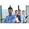 business people group joining hands and stay as team in circle  and representing concept of friendship and teamwork